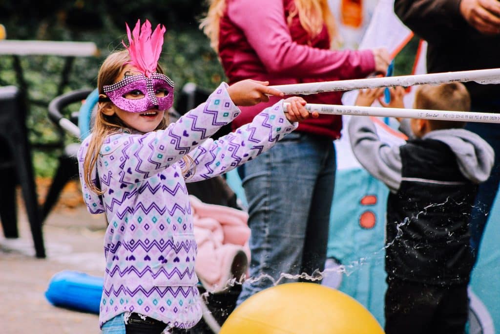 little kid girl at a carnival